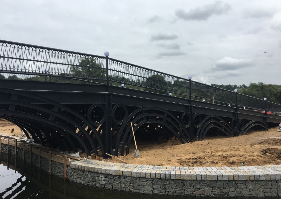 Фото проекта Пешеходно-автомобильный мост из металлоконструкций